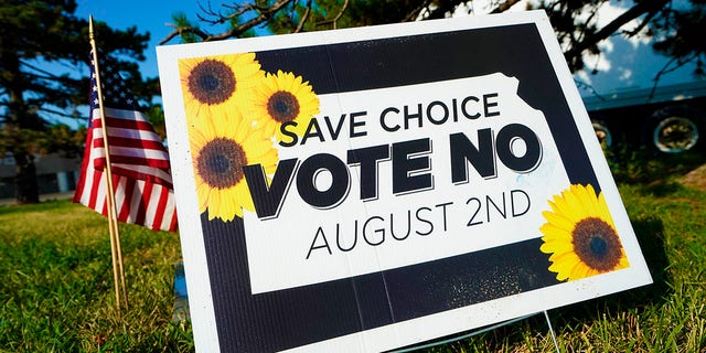 A Vote No to a Constitutional Amendment on Abortion sign is on display outside a polling station on August 01, 2022 in Olathe, Kansas.