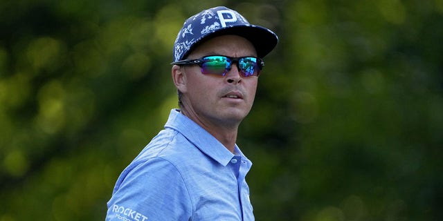 Rickie Fowler walks from the 13th tee during the Wyndham Championship at Sedgefield Country Club on Aug. 5, 2022, in Greensboro, North Carolina.