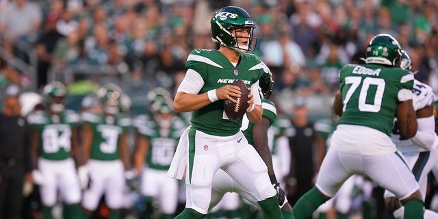 Zach Wilson (2) of the New York Jets looks to pass during a preseason game against the Philadelphia Eagles game at Lincoln Financial Field August 12, 2022, in Philadelphia. The Jets defeated the Eagles 24-21. 