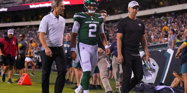 Zach Wilson (2) of the New York Jets walks to the locker room after being injured against the Philadelphia Eagles in the first half of a preseason game at Lincoln Financial Field Aug. 12, 2022 in Philadelphia. 