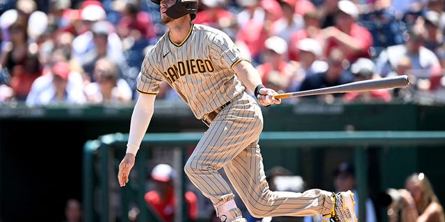 Wil Myers, #5 of the San Diego Padres, bats against the Washington Nationals at Nationals Park on August 14, 2022 in Washington, D.C. 