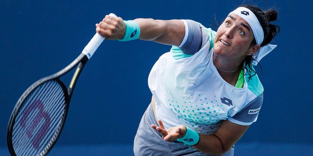 Ons Jabeur of Tunisia serves against Petra Kvitova of the Czech Republic in the third round of women's singles at the Lindner Family Tennis Center August 18, 2022, in Mason, Ohio. 