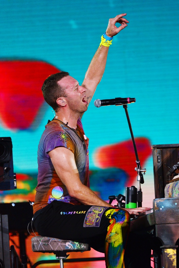 At one point, Chris Martin abruptly brought his show to a halt to ask fans to stop filming on their cell phones and be present instead.