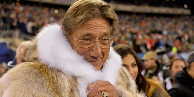 Joe Namath in a mink coat for the Super Bowl coin toss at MetLife Stadium in East Rutherford, New Jersey, on Feb. 2, 2014.