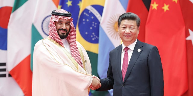 Chinese President Xi Jinping (right) shakes hands with Saudi Arabian Crown Prince Mohammed bin Salman at the G20 Summit Sept. 4, 2016, in Hangzhou, China. At the time of the photo, Mohammed bin Salman was Deputy Crown Prince and Minister of Defense.