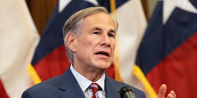 Texas Governor Greg Abbott announces the reopening of more Texas businesses during the COVID-19 pandemic at a press conference at the Texas State Capitol in Austin on Monday, May 18, 2020.