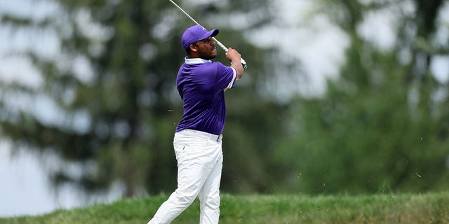 Harold Varner III plays a second shot on the fifth hole during the final round of the BMW Championship at Wilmington Country Club in Wilmington, Delaware, on Aug. 21, 2022.