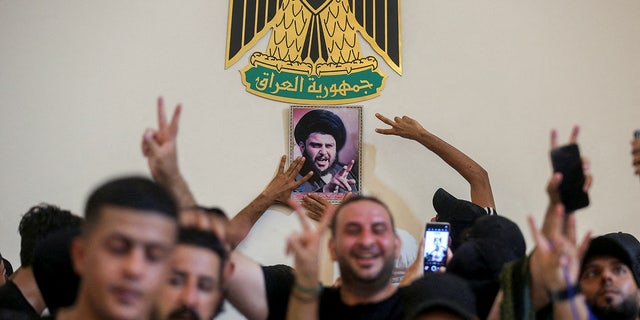 Supporters of Iraqi populist leader Moqtada al-Sadr protest inside the Republican Palace in the Green Zone in Baghdad, Iraq August 29, 2022. REUTERS/Alaa Al-Marjani