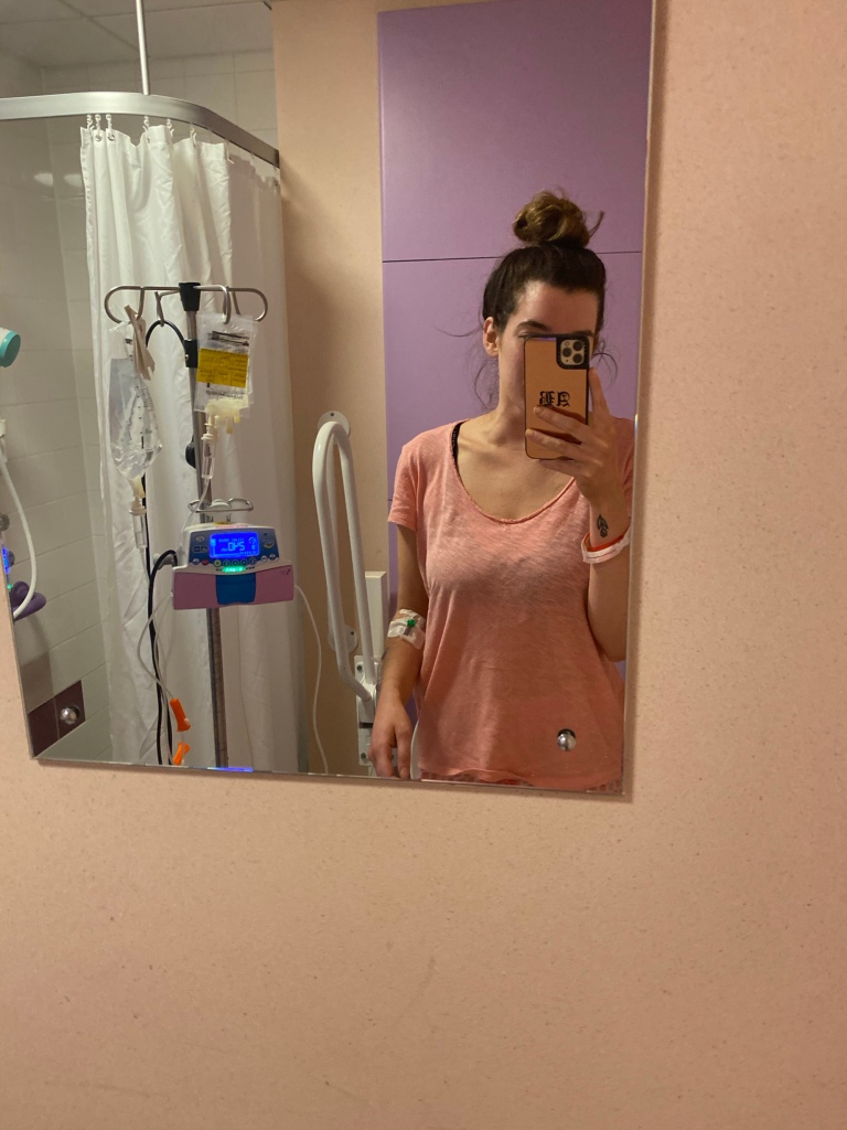 Alix Burnard attached to IVs in the hospital