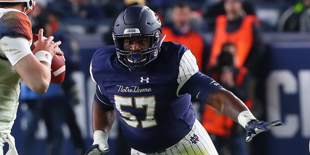 Notre Dame Fighting Irish defensive lineman Jayson Ademilola, #57, during the College Football game between the Notre Dame Fighting Irish and the Syracuse Orange on November 17, 2018 at Yankee Stadium in the Bronx, New York.