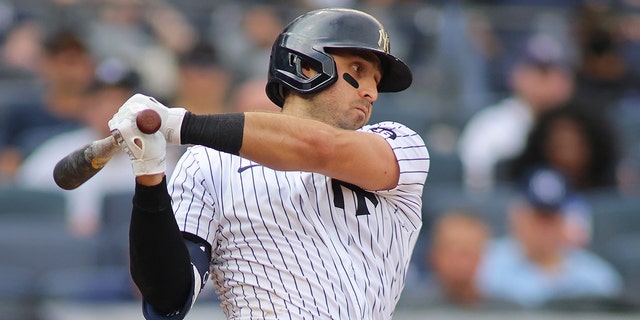 Joey Gallo #13 of the New York Yankees in action against the Tampa Bay Rays at Yankee Stadium on Oct. 3, 2021 in New York City. New York Yankees defeated the Tampa Bay Rays 1-0.