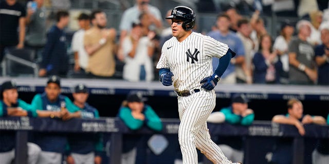 New York Yankees' Jose Trevino runs the bases after hitting a home run during the eighth inning of a baseball game against the Seattle Mariners, Monday, Aug. 1, 2022, in New York. 