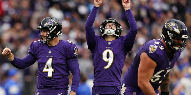 Ravens' Justin Tucker reacts after a successful field goal against the Los Angeles Rams on Jan. 2, 2022, in Baltimore.