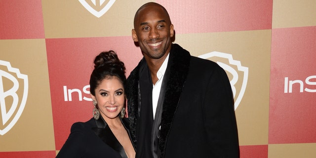 Basketball player Kobe Bryant and wife Vanessa Bryant seen in this 2013 photo in Beverly Hills, California.  (Photo by Jason Merritt/Getty Images)