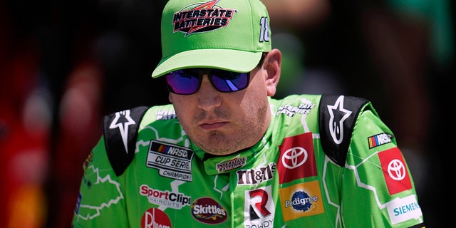 Kyle Busch watches during qualifying at the Michigan International Speedway in Brooklyn, Michigan, on Aug. 6, 2022.