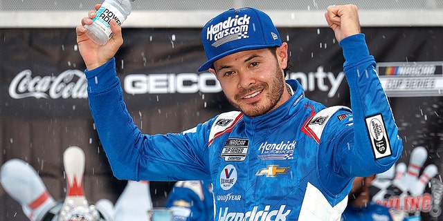 Kyle Larson celebrates after winning at Watkins Glen International on Aug. 21, 2022.