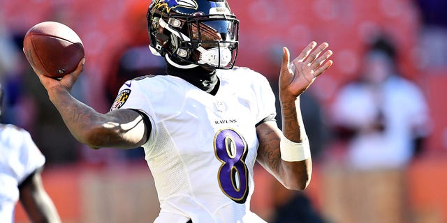 Lamar Jackson, #8 of the Baltimore Ravens, throws the ball during warm-up before the game against the Cleveland Browns at FirstEnergy Stadium on December 12, 2021 in Cleveland.