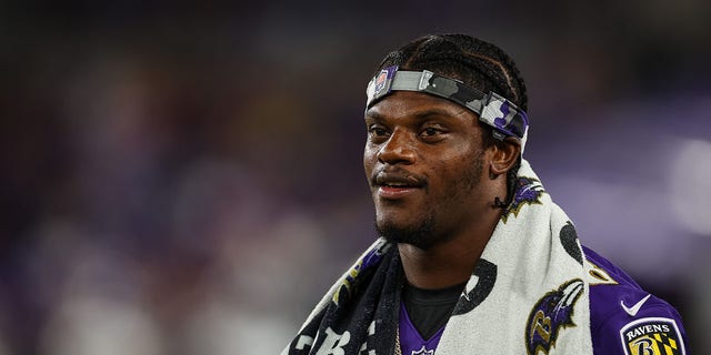 Lamar Jackson, #8 of the Baltimore Ravens, looks on against the Tennessee Titans during the second half at M&amp;T Bank Stadium on August 11, 2022 in Baltimore.