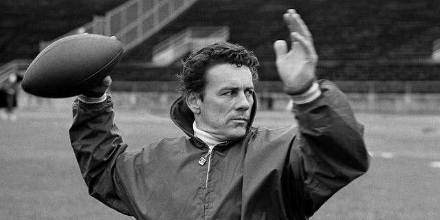 Len Dawson of the Kansas City Chiefs running through passing drills with receivers in New Orleans to prepare for the Super Bowl, in January 1970.