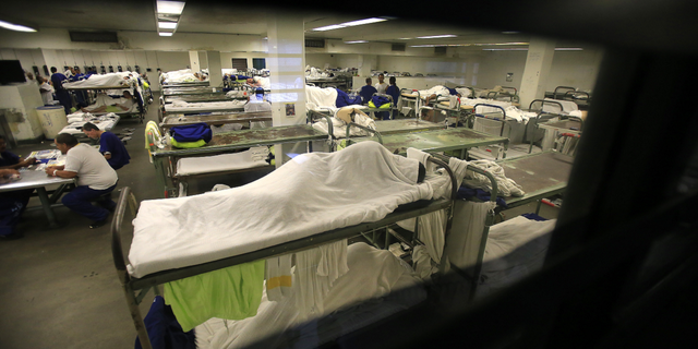 Inmates crowd a dorm room inside the Men's Central Jail on Aug. 8, 2014, in Los Angeles.