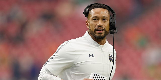 Head coach Marcus Freeman of the Notre Dame Fighting Irish during the PlayStation Fiesta Bowl at State Farm Stadium on January 01, 2022 in Glendale, Arizona. The Cowboys defeated the Fighting Irish 37-35. 