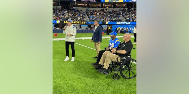 Marcus Mason and Bob Bemis honored at SoFi Stadium.