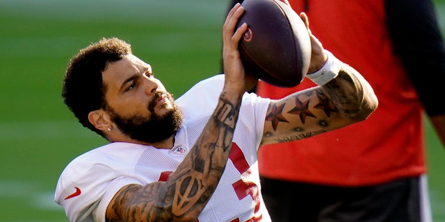 Tampa Bay Buccaneers wide receiver Mike Evans (13) makes a catch during training camp Aug. 28, 2020, in Tampa, Fla.