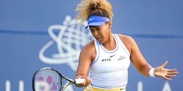 Naomi Osaka of Japan returns a shot from Qinwen Zheng of China during the Mubadala Silicon Valley Classic, part of the Hologic WTA Tour, at Spartan Tennis Complex on August 02, 2022 in San Jose, California. 