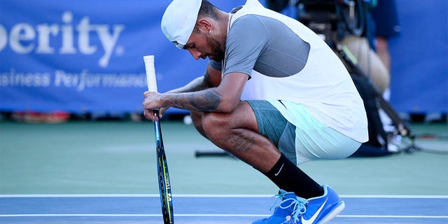 Nick Kyrgios, of Australia, pauses on the court after he beat Yoshihito Nishioka, of Japan, during a final at the Citi Open tennis tournament Sunday, Aug. 7, 2022, in Washington. Kyrgios won 6-4, 6-3.