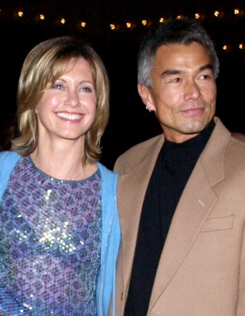 Newton-John is pictured with her then-boyfriend Patrick McDermott prior to his mysterious disappearance in 2005. 