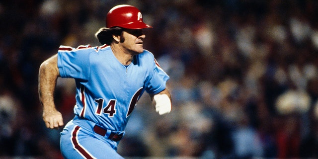 Pete Rose of the Philadelphia Phillies runs to first base during the World Series against the Kansas City Royals at Royals Stadium in Kansas City, Missouri, in October 1980.