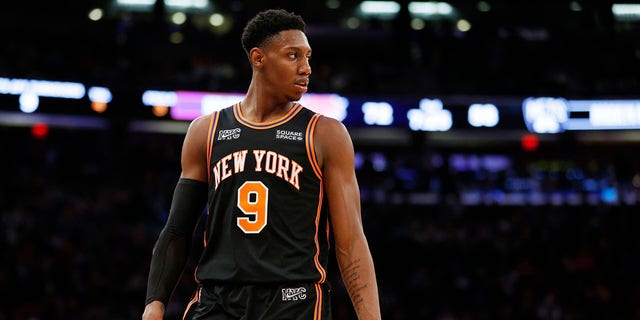 RJ Barrett, #9 of the New York Knicks, looks on during the second half against the Brooklyn Nets at Madison Square Garden on April 06, 2022 in New York City. The Nets won 110-98.