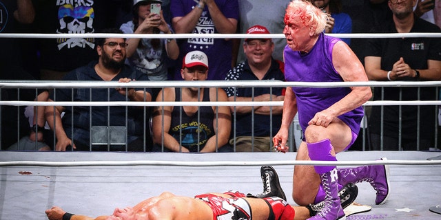  Ric Flair bloodied up during "Ric Flair's Last Match" at Nashville Municipal Auditorium on July 31, 2022 in Nashville, Tennessee.