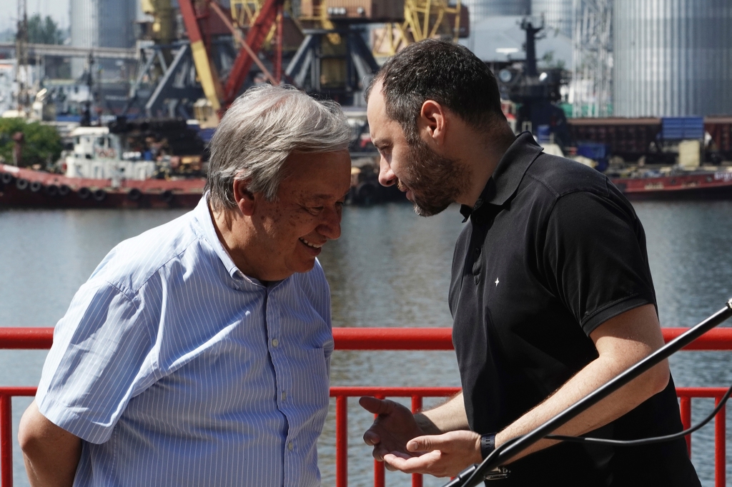 United Nations Secretary General Antonio Guterres, left, listens to Ukrainian minister of infrastructure Alexander Kubrakov as he visits the Odesa Sea Port, in Odesa, Ukraine, Friday, Aug. 19, 2022.