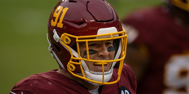 Washington's Ryan Kerrigan celebrates after recording a sack against the Dallas Cowboys at FedExField on Oct. 25, 2020, in Landover, Maryland.