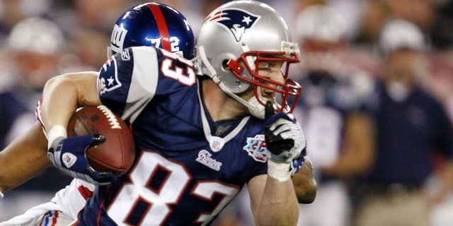 Wide receiver Wes Welker #83 of the New England Patriots runs with the ball against the New York Giants during Super Bowl XLII on Feb. 3, 2008, at University of Phoenix Stadium in Glendale, Arizona.