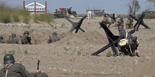 Each day, a nearly hour-long reenactment commemorates D-Day: the military operation where the Allied forces stormed the beaches of Normandy in 1944.