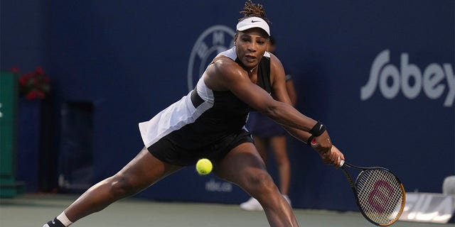 Serena Williams runs down a shot from Belinda Bencic of Switzerland during the National Bank Open tennis tournament on Aug. 10, 2022, in Toronto.