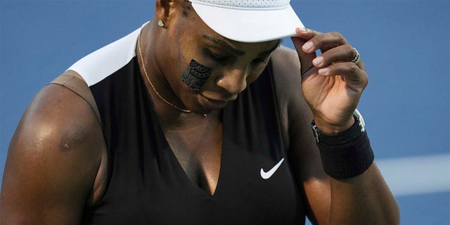 Serena Williams reacts after her loss to Belinda Bencic of Switzerland during the National Bank Open tennis tournament on Aug. 10, 2022, in Toronto.