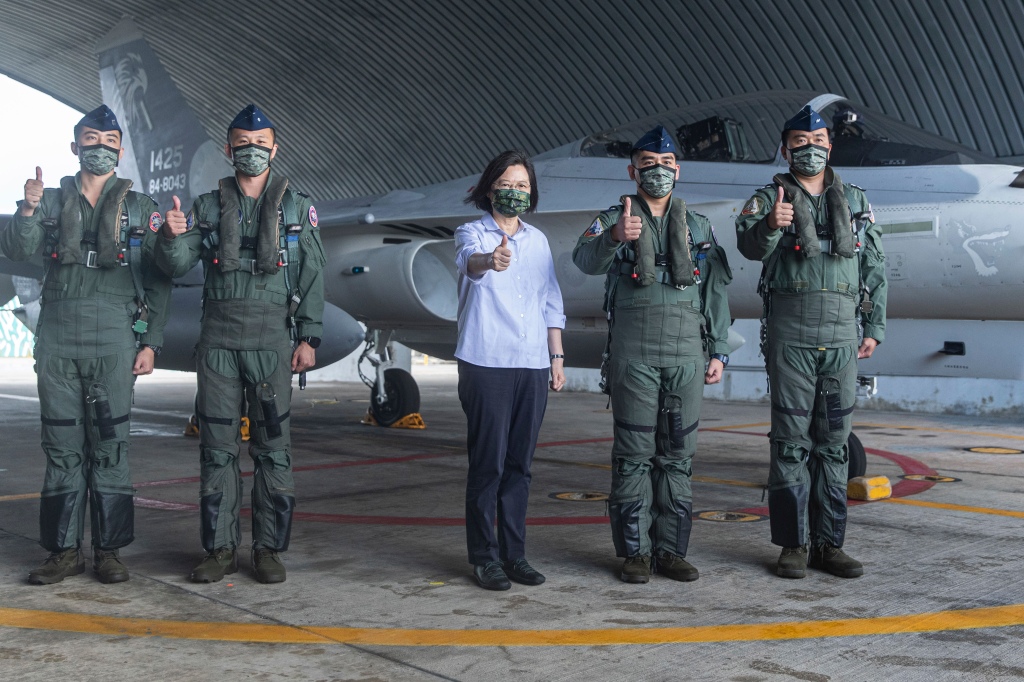 Taiwan's President Tsai Ing-wen poses with the military unit before she was briefed during a visit to a naval station on Penghu on Aug 30, 2022.