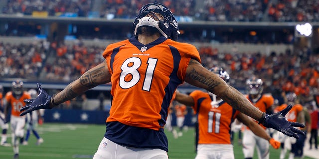 Denver Broncos wide receiver Tim Patrick celebrates catching a touchdown pass against the Dallas Cowboys in Arlington, Texas, Nov. 7, 2021.