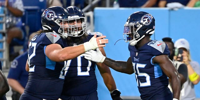 Tennessee Titans tight end Chigoziem Okonkwo (85) is congratulated after catching a touchdown pass against the Tampa Bay Buccaneers in the first half of a preseason NFL football game Saturday, Aug. 20, 2022, in Nashville, Tenn.