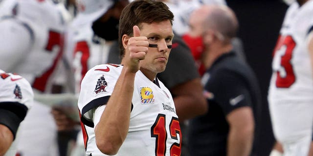 Tom Brady, #12 of the Tampa Bay Buccaneers, gives a thumbs up in the third quarter against the Las Vegas Raiders at Allegiant Stadium on October 25, 2020 in Las Vegas.