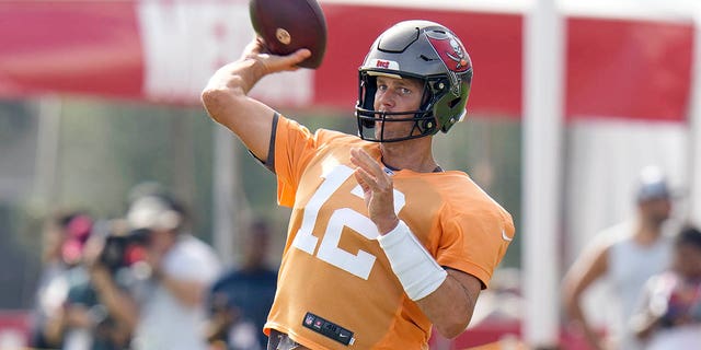 Tampa Bay Buccaneers quarterback Tom Brady throws during practice on Aug. 10, 2022, in Tampa, Florida.