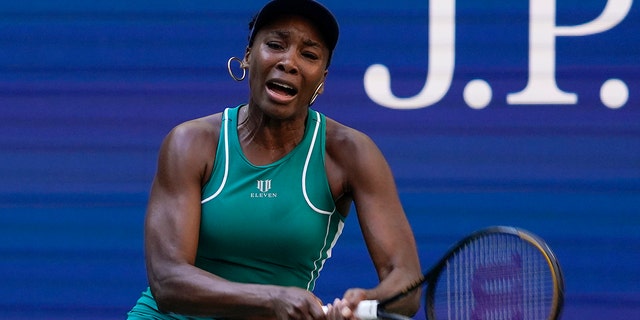 Venus Williams returns a shot to Alison Van Uytvanck of Belgium during the first round of the U.S. Open in New York on Aug. 30, 2022.