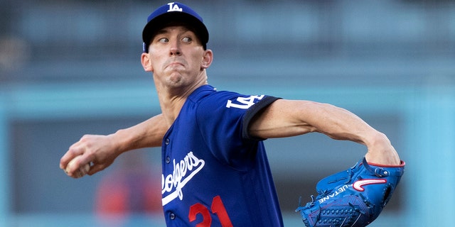 Los Angeles Dodgers starting pitcher Walker Buehler throws to a New York Mets batter during the first inning of a game in Los Angeles June 4, 2022. 