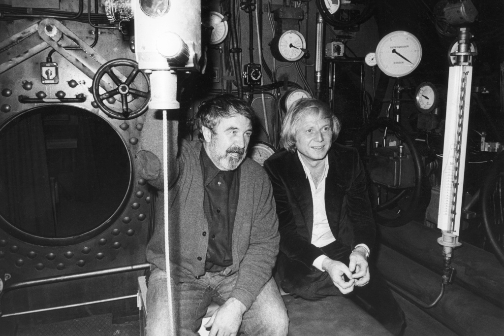 Wolfgang Petersen and the writer Lothar-Günther Buchheim sit in the original replica submarine for "Das Boot" on October 17, 1979. 