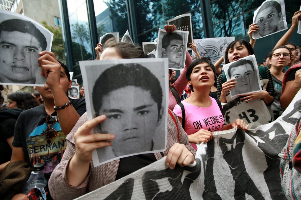 Students of several Mexican universities protest for the 43 missing students in Mexico City on October 15, 2014.