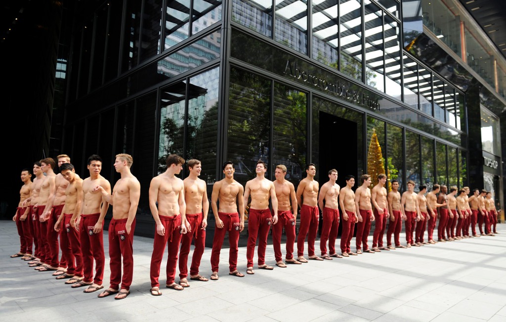 Abercrombie models pose outside of a store