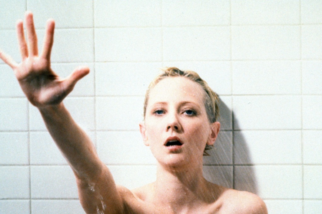 Anne Heche stands in a shower in a scene from the film 'Psycho', 1998.